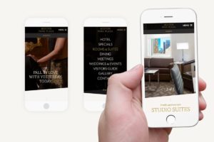 three mobile devices showing a website landing page, full screen menu, and room
