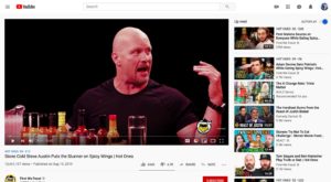 youtube image of steve austin eating hot wings with a column on the right of upcoming videos